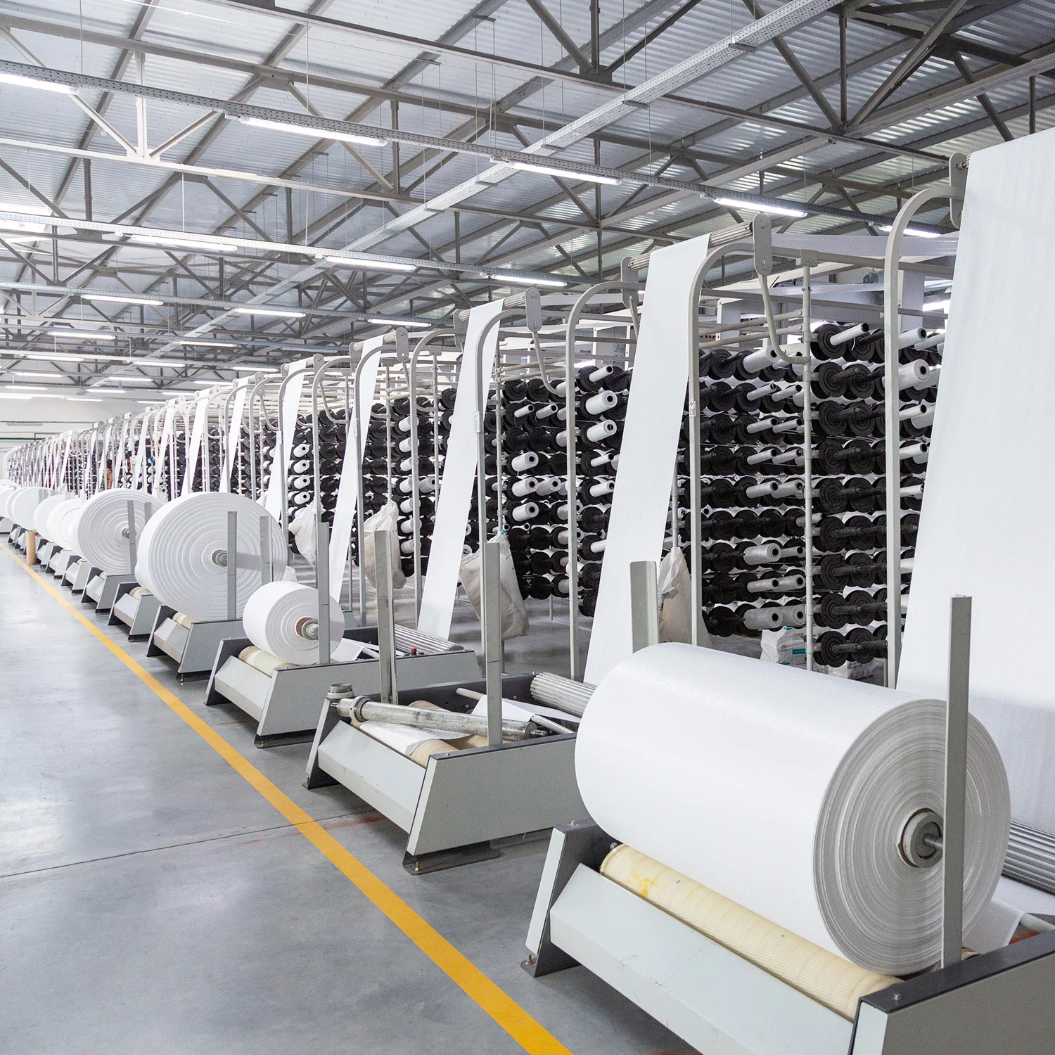PP/HDPE woven fabric rolls on factory production line