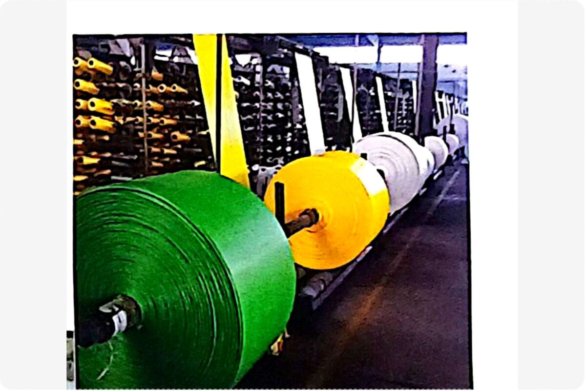 PP woven fabric rolls in green, yellow and white