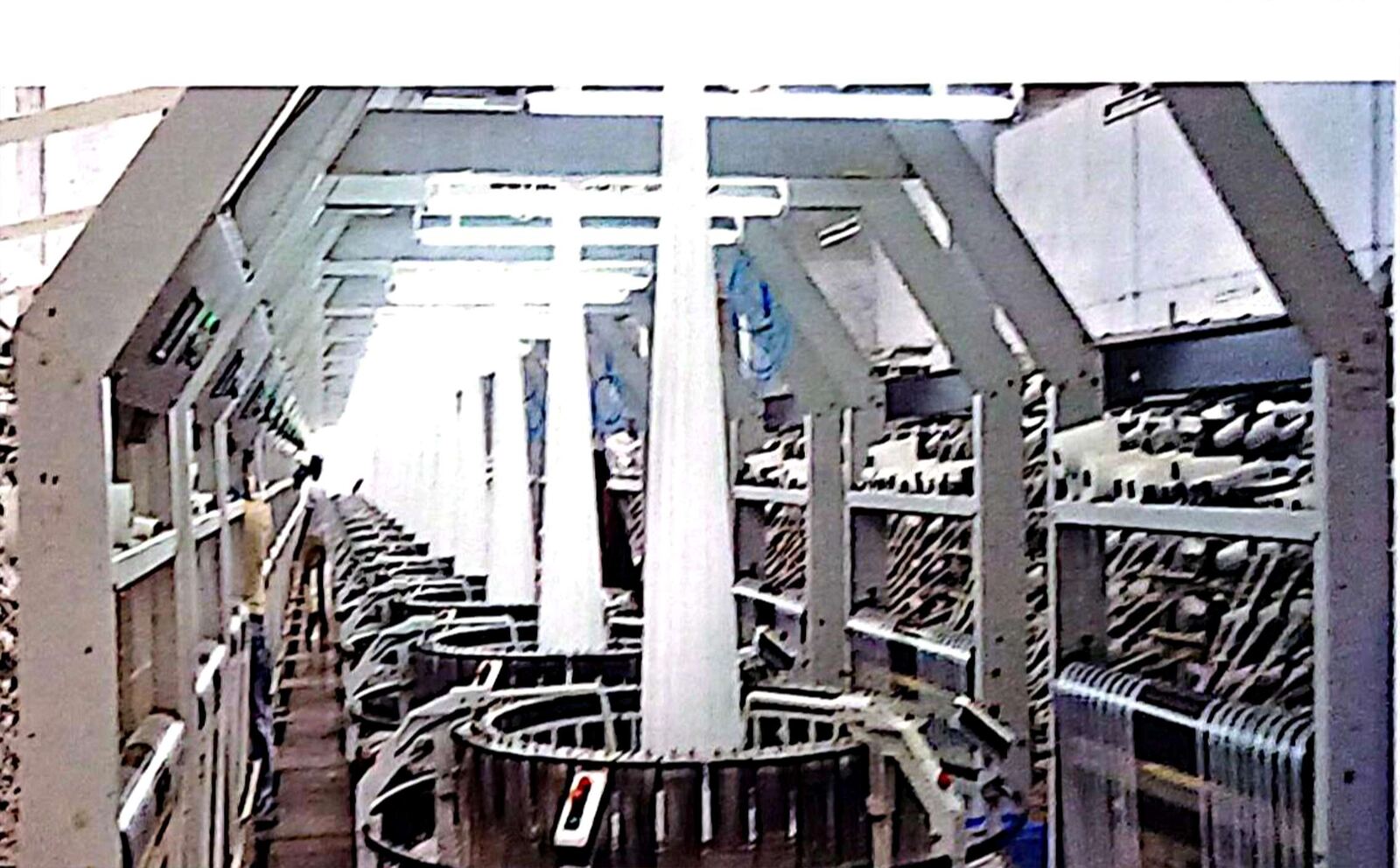 High-speed circular looms weaving PP fabric at Tayal Vinimay's Gujarat plant